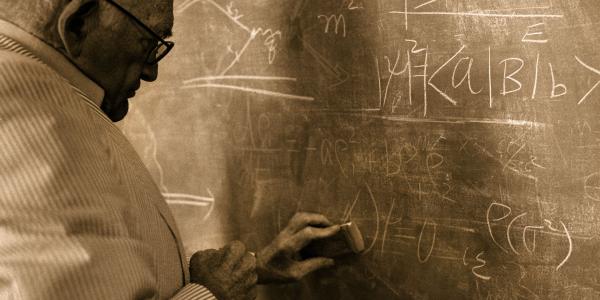 Sidney Drell at blackboard, 2002