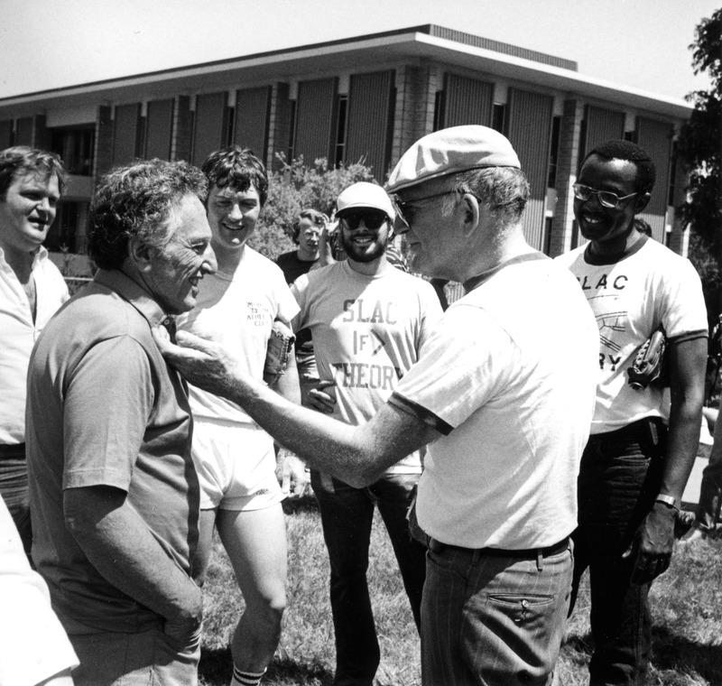 Joe Ballm and Sid Drell with group